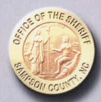 1 1/8" Engraved rim emblem with center seal in die