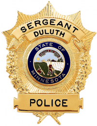 Badge Shield with Sunburst and Wreath Edge