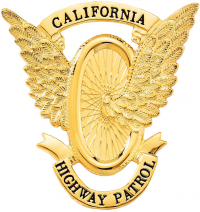 Badge with Winged Wheel